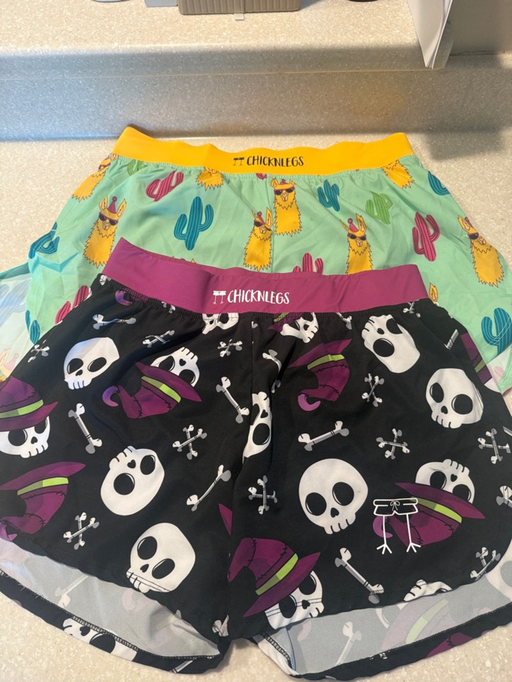 CHICKNLEGS Men’s Athletic Shorts - Black Skull Print & Mint Llama